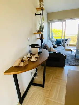 Coin salon dans l'établissement Appartement côte d’Azur Plage - piscine - tennis