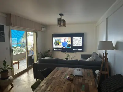 Télévision ou salle de divertissement dans l'établissement Appartement 60m2 à 500m des plages