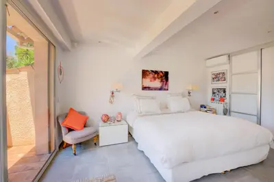 Un ou plusieurs lits dans un hébergement de l'établissement MAGNIFIQUE VILLA 8 PERSONNES