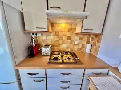 Cuisine ou kitchenette dans l'établissement Kent studio by Welcome to Cannes