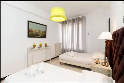 Un ou plusieurs lits dans un hébergement de l'établissement LUXURY APARTMENT between ANTIBS and CROISETTE