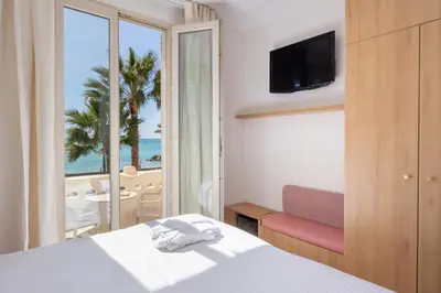 Un ou plusieurs lits dans un hébergement de l'établissement Hotel Royalmar