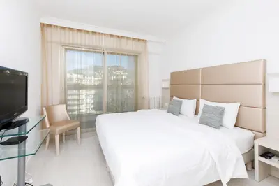 Un ou plusieurs lits dans un hébergement de l'établissement On La Croisette deluxe 2 bedrooms 2 baths