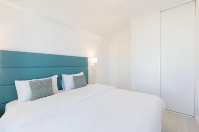 Un ou plusieurs lits dans un hébergement de l'établissement On La Croisette deluxe 2 bedrooms 2 baths