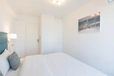 Un ou plusieurs lits dans un hébergement de l'établissement On La Croisette deluxe 2 bedrooms 2 baths