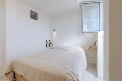 Un ou plusieurs lits dans un hébergement de l'établissement Luxurious 2-room Apartment in Palm Beach