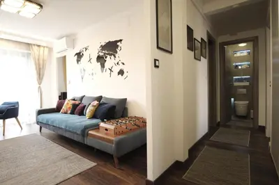 Coin salon dans l'établissement Charming AC 2-bedroom apartment Antibes city center family, couples friendly