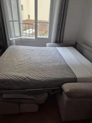 Un ou plusieurs lits dans un hébergement de l'établissement Appartement Bellarosa