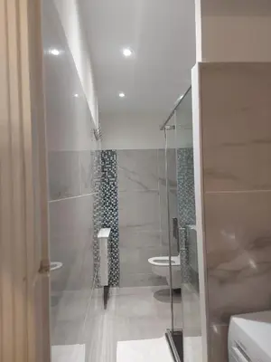Salle de bains dans l'établissement Appartement Bellarosa