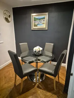 Coin salon dans l'établissement Appartement Bellarosa