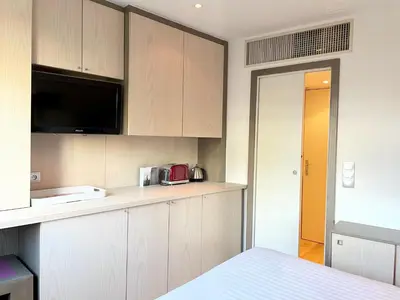 Cuisine ou kitchenette dans l'établissement Chambre idéalement située à 50m de la Croisette