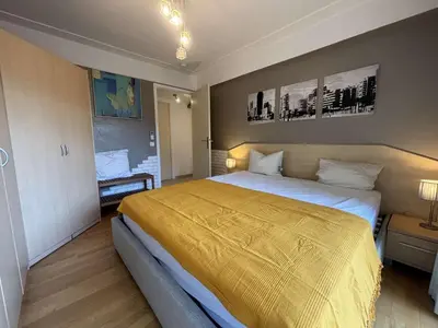 Un ou plusieurs lits dans un hébergement de l'établissement Charmant T2 avec terrasse, climatisé, centre-ville Antibes, proche mer et commerces - FR-1-252-177