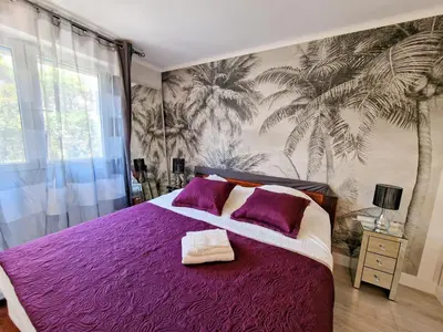 Un ou plusieurs lits dans un hébergement de l'établissement Cannes Appartement Palais Festivals