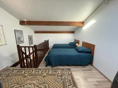 Un ou plusieurs lits dans un hébergement de l'établissement Les Villas du Parc