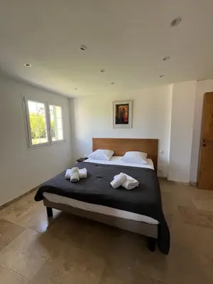 Un ou plusieurs lits dans un hébergement de l'établissement Les Villas du Parc