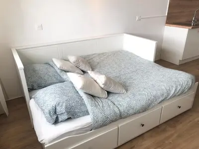 Un ou plusieurs lits dans un hébergement de l'établissement Superbe appartement front de mer