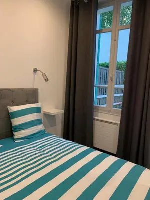 Un ou plusieurs lits dans un hébergement de l'établissement Appartement 2 pièces centre ville Cannes