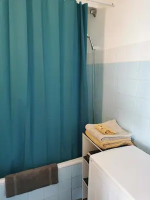 Un ou plusieurs lits dans un hébergement de l'établissement Grand studio de 33m² à 300m des plages