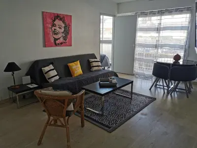 Coin salon dans l'établissement Grand studio de 33m² à 300m des plages