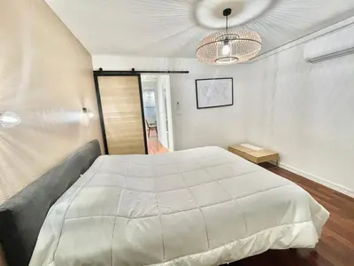 Un ou plusieurs lits dans un hébergement de l'établissement Carré d'or Duplex, by Welcome to Cannes