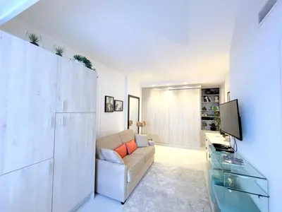 Télévision ou salle de divertissement dans l'établissement Marema appartement, by Welcome to Cannes