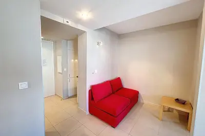 Coin salon dans l'établissement HENRI CAMILLE REAL ESTATE - Rouaze 2 -Studio à 50m center