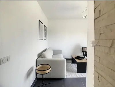 Coin salon dans l'établissement Superbe Appartement 2p avec place de parking