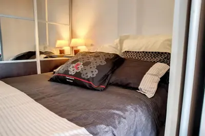 Un ou plusieurs lits dans un hébergement de l'établissement AGENCE HENRI CAMILLE - Rouaze 1Studio à 50m du Martinez et du centre ville