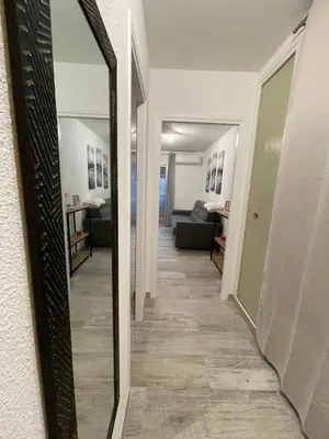 Un ou plusieurs lits dans un hébergement de l'établissement Appartement de charme à 2 min de la plage