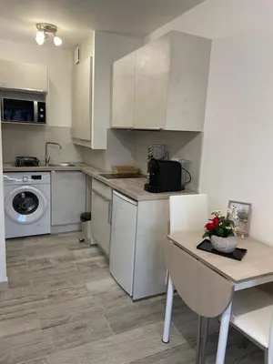 Cuisine ou kitchenette dans l'établissement Appartement de charme à 2 min de la plage