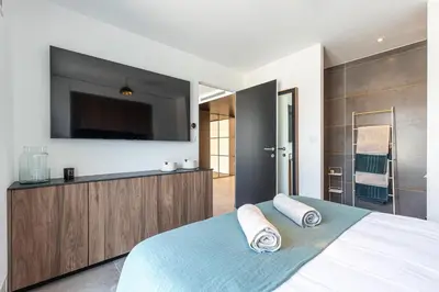 Un ou plusieurs lits dans un hébergement de l'établissement LUXURIOUS PENTHOUSE ROOFTOP MARTINEZ CROISETTE