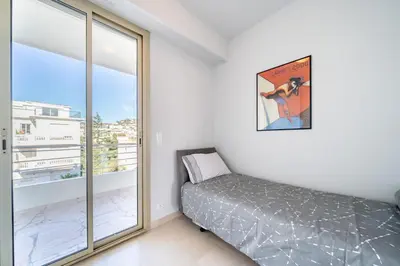 Un ou plusieurs lits dans un hébergement de l'établissement Palm beach- Free Wifi- Parking- Sea View