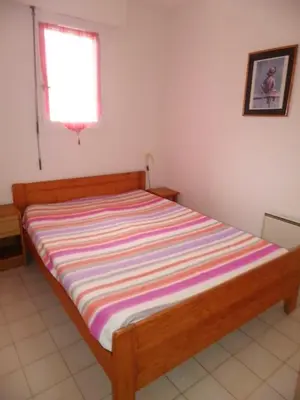 Un ou plusieurs lits dans un hébergement de l'établissement Appartement charmant à Cagnes-sur-Mer - 38 m² - Piscine