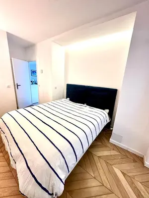 Un ou plusieurs lits dans un hébergement de l'établissement Garden sea view - Victoria - Le Cannet