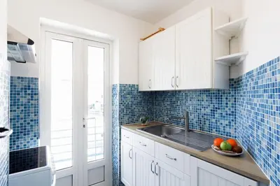 Cuisine ou kitchenette dans l'établissement Chez Fabio