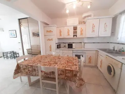 Cuisine ou kitchenette dans l'établissement Palais des Iles