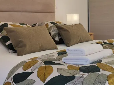 Un ou plusieurs lits dans un hébergement de l'établissement CHESTER Riviera Escape - Appartement calme, terrasse & clim proche Croisette et centre
