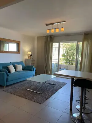 Coin salon dans l'établissement Fully equipped beachfront studio in the heart of the city center bd Leclerc