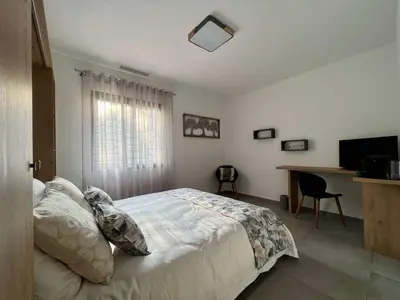 Un ou plusieurs lits dans un hébergement de l'établissement Chambres d’hôtes Le Moment Pour Soi - Mougins