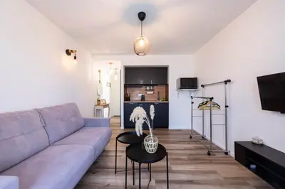 Télévision ou salle de divertissement dans l'établissement Appartement bord de mer