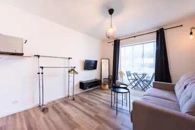 Télévision ou salle de divertissement dans l'établissement Appartement bord de mer