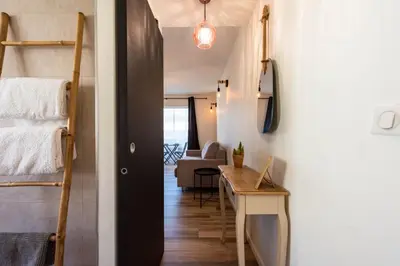 Coin salon dans l'établissement Appartement bord de mer