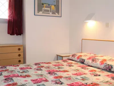 Un ou plusieurs lits dans un hébergement de l'établissement Appartement 3P en RDJ avec Jardin, accès plage direct, 4 à 6 couchages - Villeneuve-Loubet Plage - FR-1-252A-73
