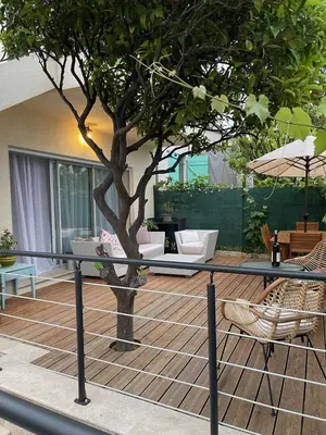 Balcon ou terrasse dans l'établissement 2 pièces en RDJardin avec 2 grands Terrasses