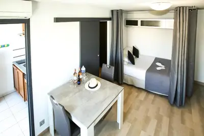 Un ou plusieurs lits dans un hébergement de l'établissement Cannes Studio Centre GAMBETTA