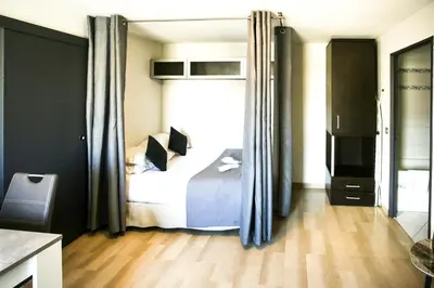 Un ou plusieurs lits dans un hébergement de l'établissement Cannes Studio Centre GAMBETTA