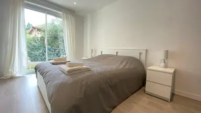 Un ou plusieurs lits dans un hébergement de l'établissement Vilmorin Appartement 1 Chambre proche de gare, plage, centre