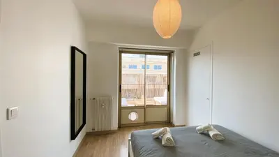 Un ou plusieurs lits dans un hébergement de l'établissement T2 Bricka La Terrasse de la plage, Moderne, équipé, Lumineux