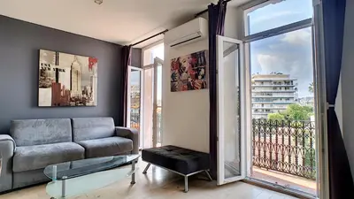 Coin salon dans l'établissement Superbe appartement vue dégagée sur des jardins