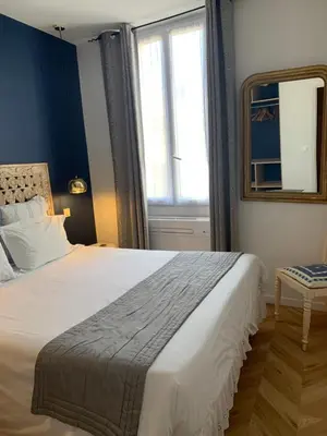 Un ou plusieurs lits dans un hébergement de l'établissement Lumineux 2 pièces Vieil Antibes